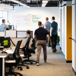 An image showcasing a vibrant, modern office environment with individuals actively working at standing desk chairs
