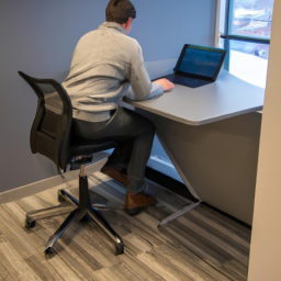 An image featuring a modern office setup with a standing desk chair as the centerpiece